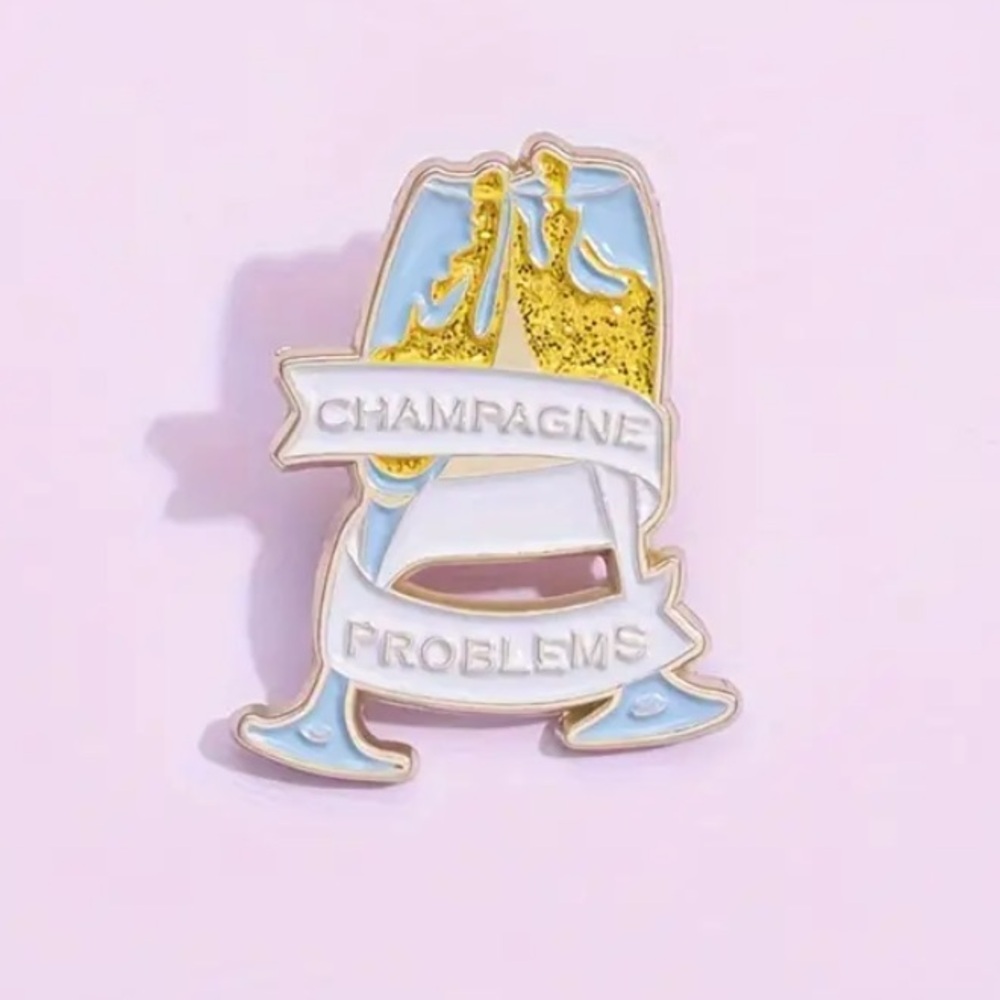 CHAMPAGNE PROBLEMS - TAYLOR PIN